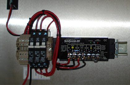 Pre-wired Class 1 Div 2 SunSaver controller mounted on control backplate with breakers