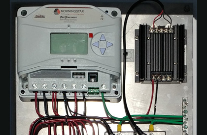 Pre-wired ProStar controller on DIN rail mounted on backplate